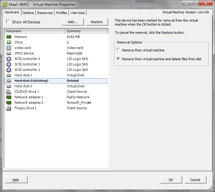 Displays the hardware tab where you select hard disk 2 for removal from the vm